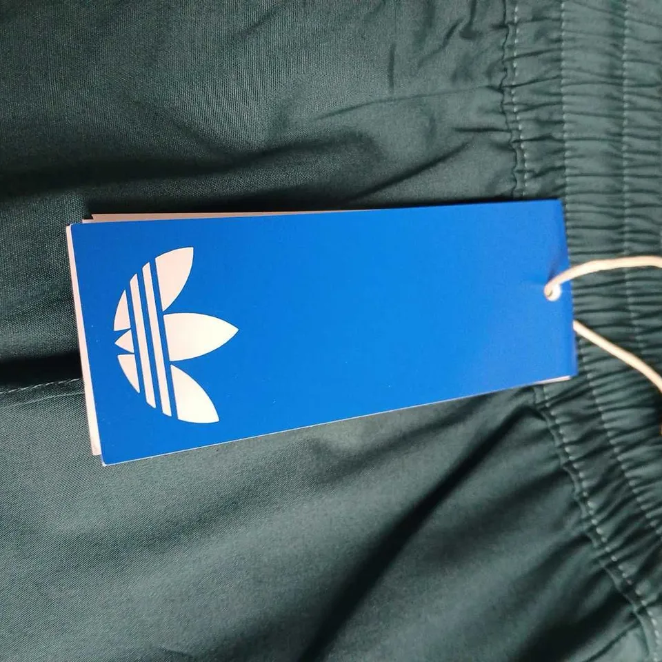 ADIDAS ORIGINALS WOMEN’S TRACK PANTS – TEAL WITH PINK SIDE STRIPES SIZE M