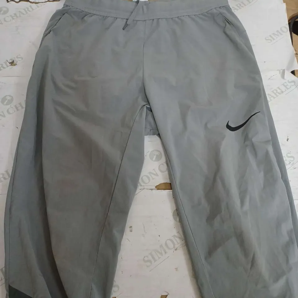 NIKE DRI FIT LIGHT GREY TROUSERS - SMALL