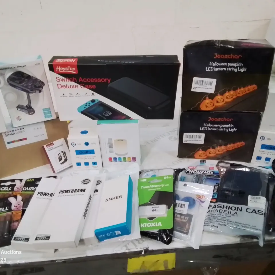 BOX CONTAINING LARGE AMOUNT OF BOXED ELECTRICAL ITEMS TO INCLUDE: SWITCH ACCESSORIES DELUXE CASE, RECHARGEABLE AAA BATTERIES, POWER BANKS, HALLOWEEN LIGHTS, CHARGING CABLES AND LOTS MORE.