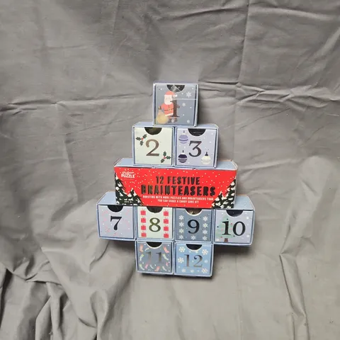 12 FESTIVE BRAIN TEASERS ADVENT CALENDAR – PUZZLE BOX SET (12 MINI BOXES)