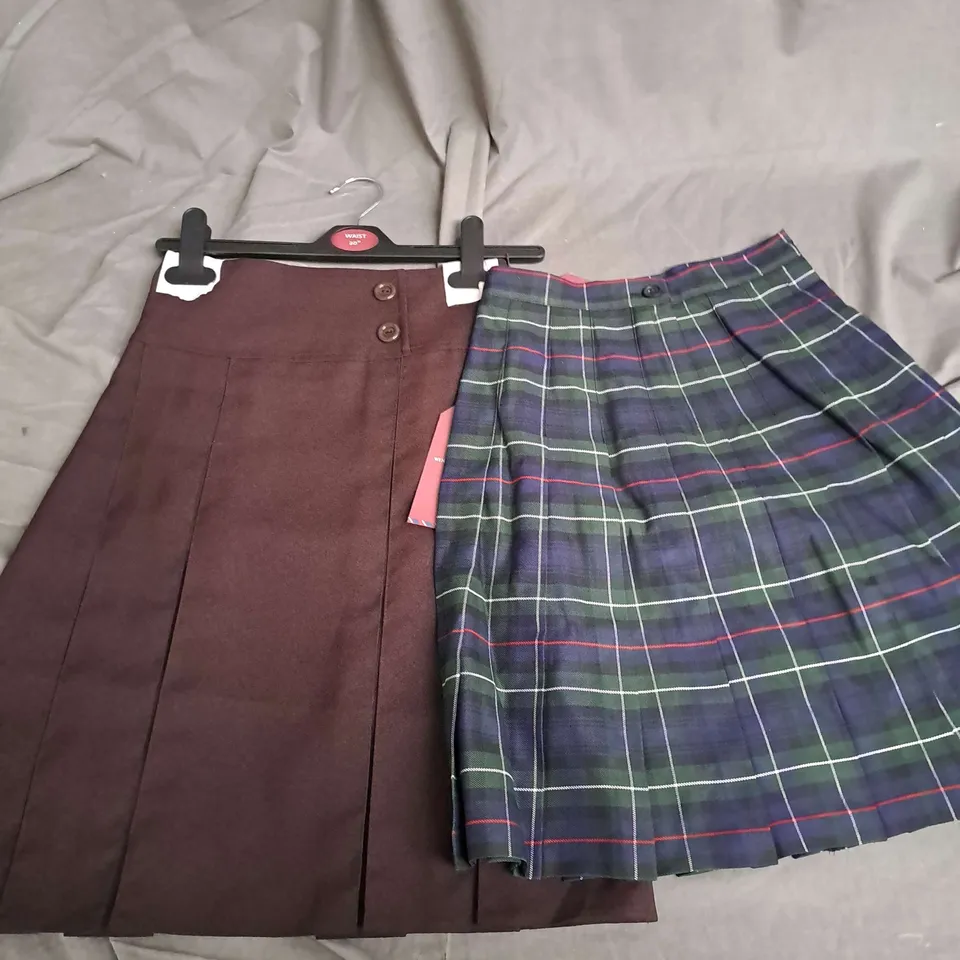 BOX OF APPROXIMATELY 40 ASSORTED SCHOOL SKIRTS IN VARIOUS COLOURS AND SIZES - COLLECTION ONLY