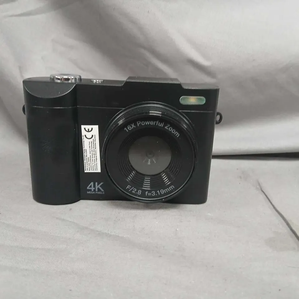DIGITAL CAMERA – BLACK COMPACT WITH FLIP-OUT LCD, 16X ZOOM