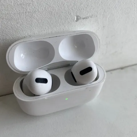 PAIR OF APPLE AIRPODS WITH CHARGING CASE 