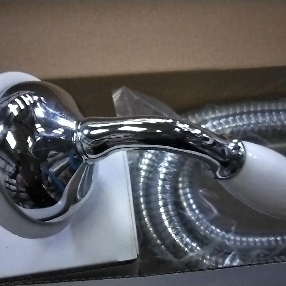BOXED AS NEW CALYPSO SANTHIA HANDSHOWER C/W SLIDE RAIL, HOSE AND OUTLET ELBOW IN CHROME