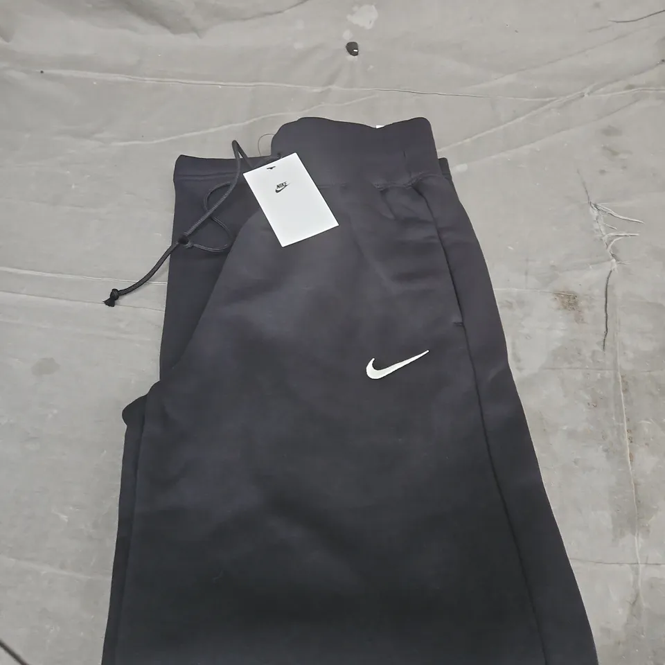 NIKE BLACK JOGGERS WITH WHITE SWOOSH – WOMENS - XS