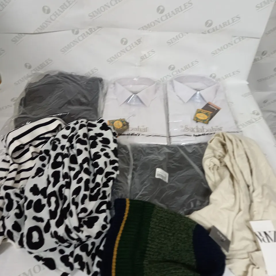 LARGE BOX OF ASSORTED CLOTHING ITEMS IN VARIOUS COLOURS AND SIZES INCLUDING TROUSERS , TOPS AND JUMPERS 