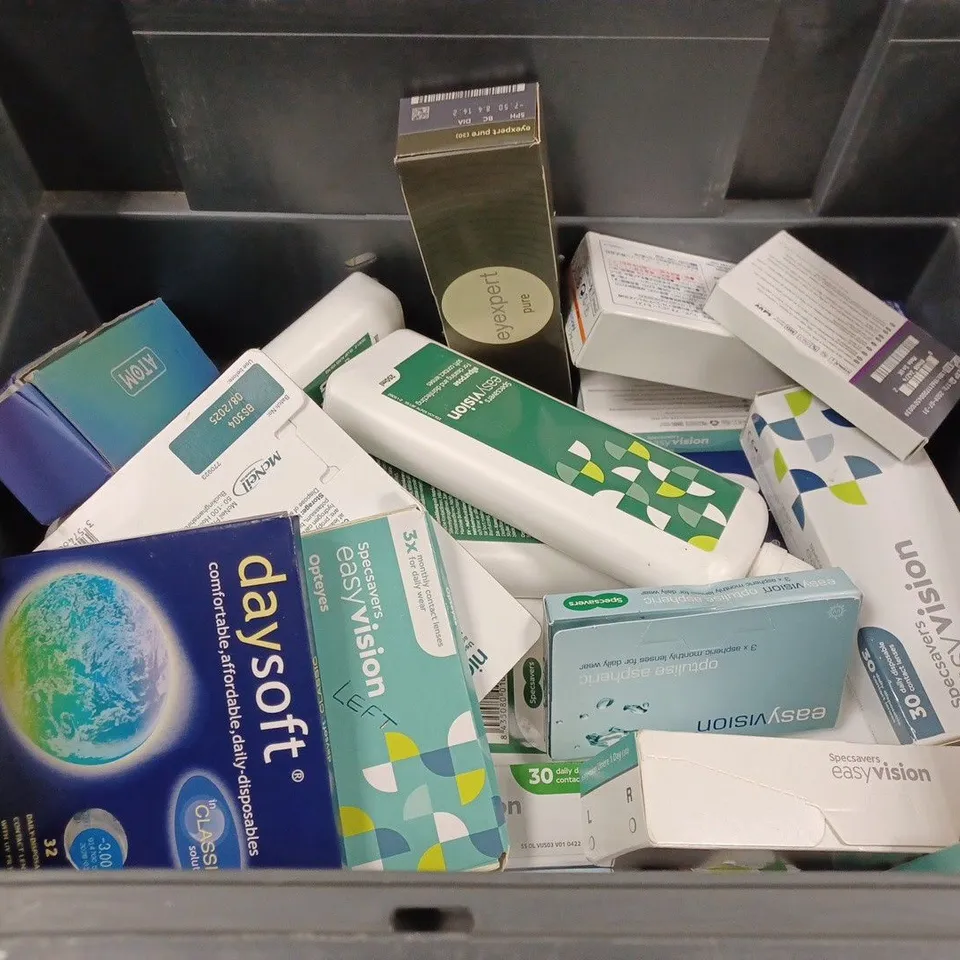 BOX TO CONTAIN APPROX. 25 X ASSORTED VISION CARE PRODUCTS. INCLUDES CONTACT LENSES AND CLEANING SOLUTION. BRANDS VARY 