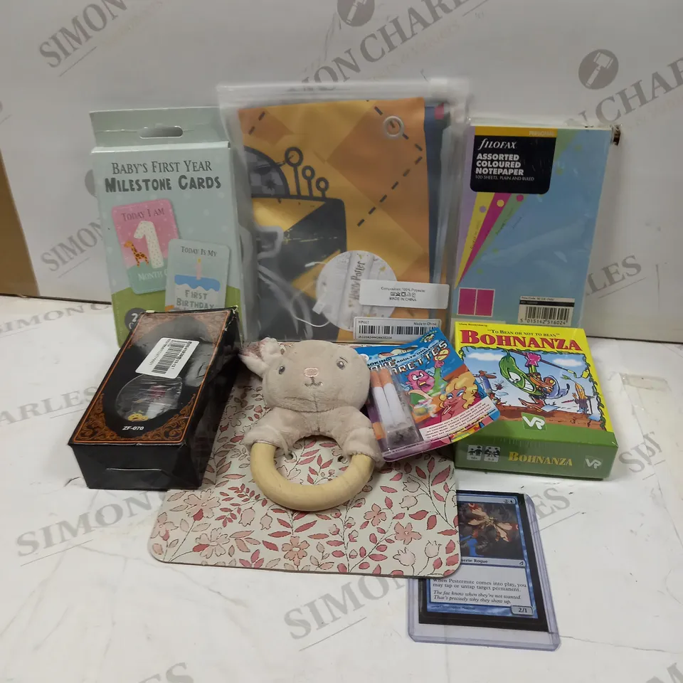 LARGE QUANTITY OF ASSORTED TOYS TO INCLUDE; BABYS FIRST YEAR MILESTONE CARDS, FILOFAX ASSORTED COLOURED NOTEPAPER, MAGIC THE GATHERING CARDS, FAKE CIGARETTES AND BUNNY TEETHER RING