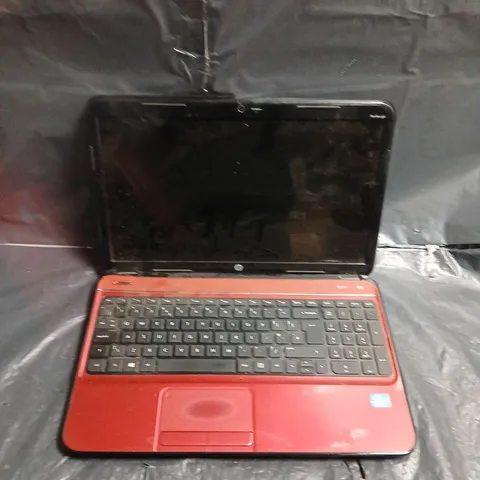 HP LAPTOP – RED - MODEL UNSPECIFIED