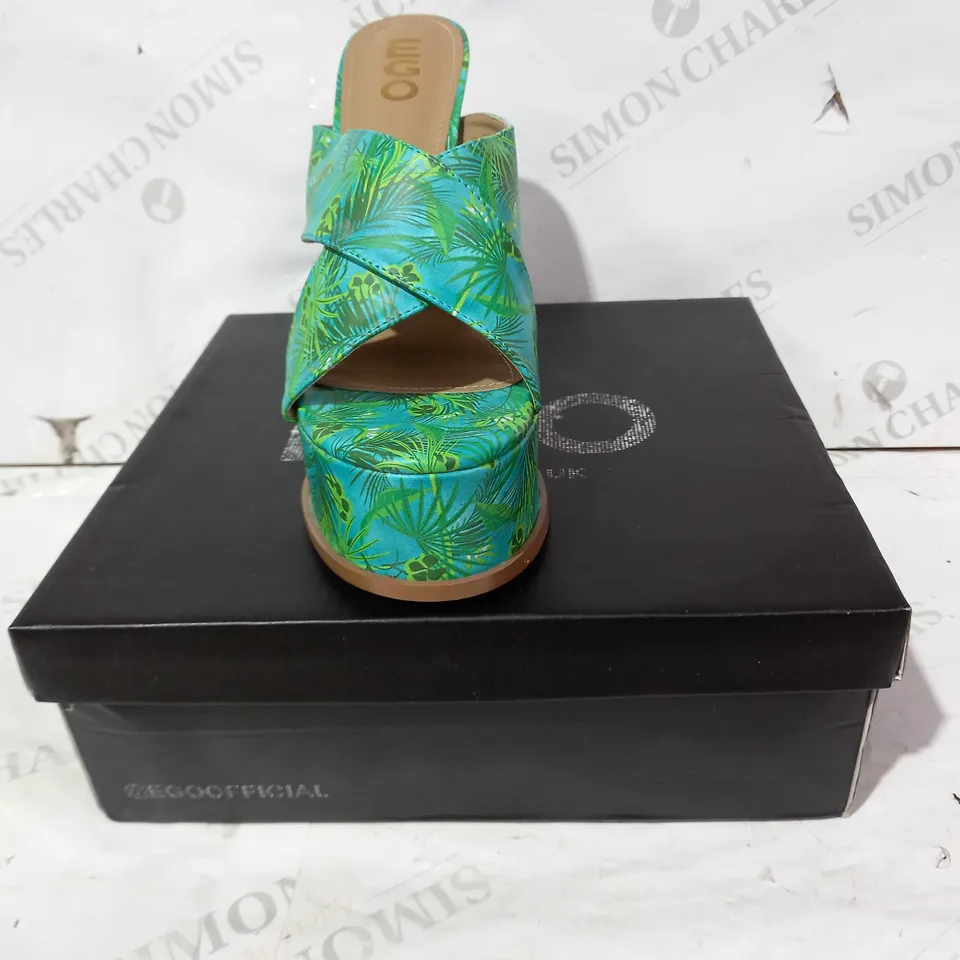 BOXED PAIR OF EGO EVERMORE PLATFORM HEELS IN GREEN WITH LEAF PATTERN UK SIZE 9