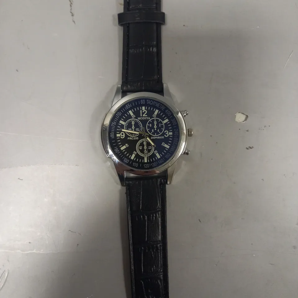 FOUR ASSORTED WATCHES IN VARIOUS STYLES TO INCLUDE MODIYA, AND YAZOLE