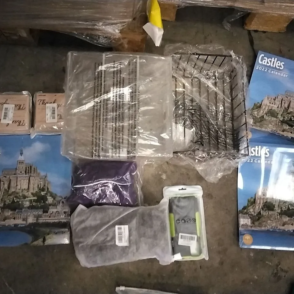PALLET OF ASSORTED ITEMS INCLUDING THE POLITICS OF PERFORMANCE, BUBBLE WELL, 2022 CASTLE CALENDER, M DESIGN PLASTIC BASKETS, M DESIGN BLACK WIRE BASKET, STAINLESS STEEL TONGS