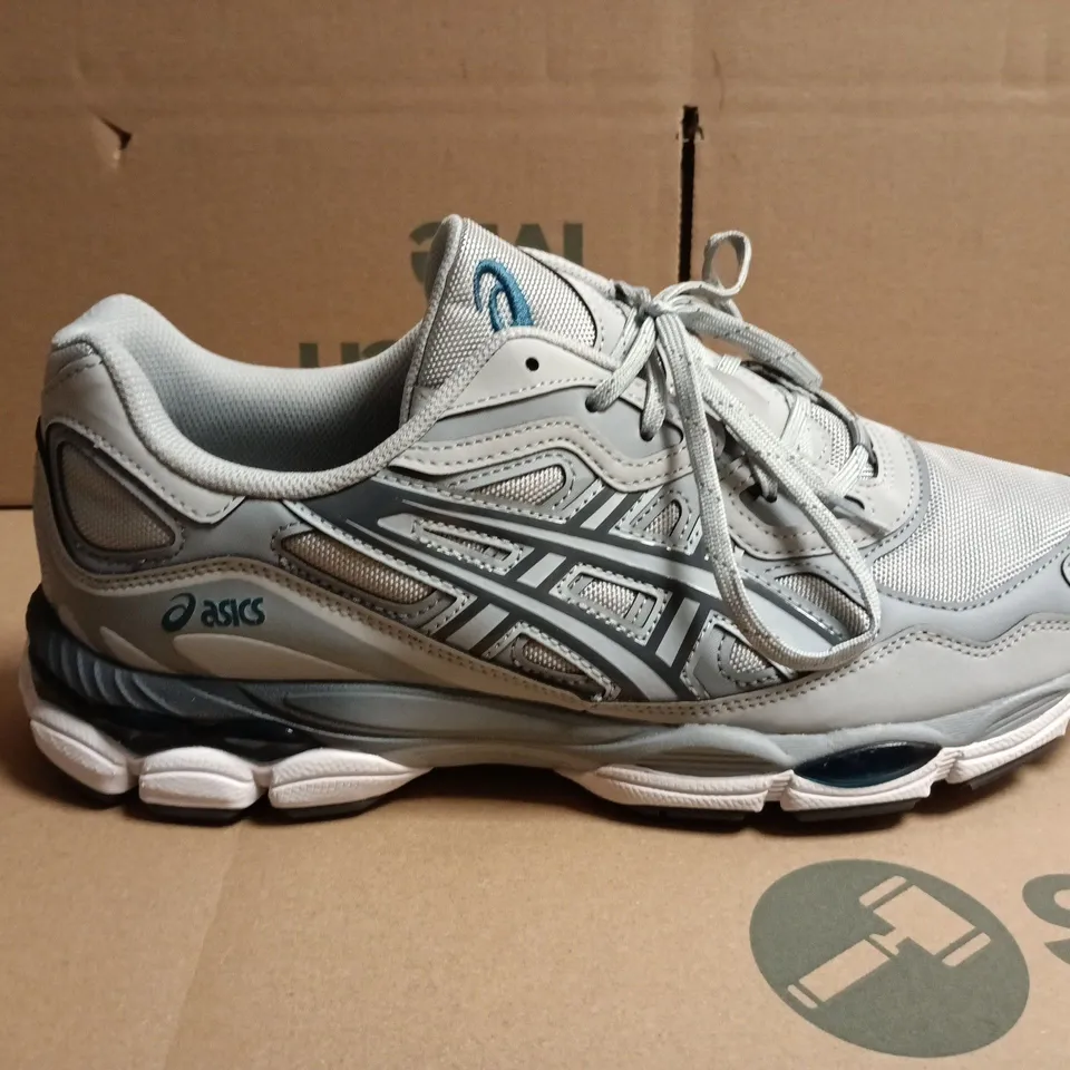 PAIR OF ASICS GREY RUNNING TRAINERS – UK SIZE 11