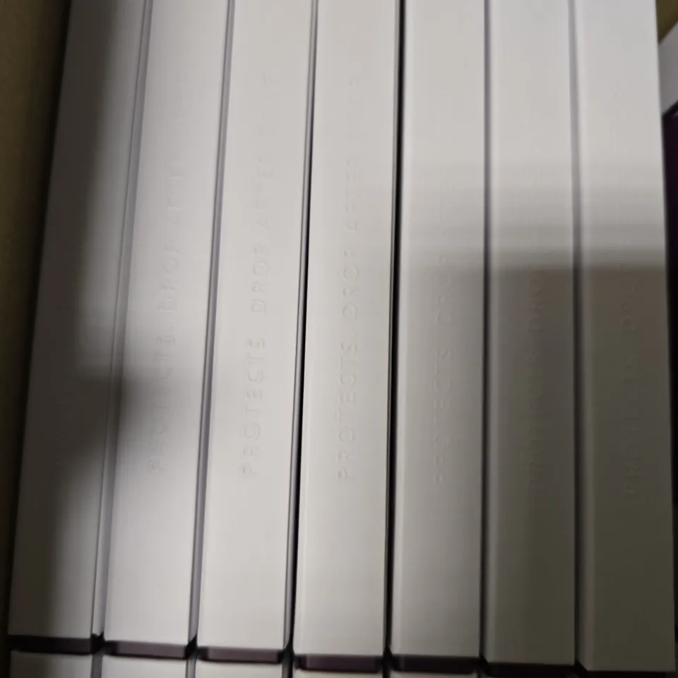 BOX OF APPROXIMATELY 100 TECH21 EVO ROX DEEP PURPLE IPHONE XR