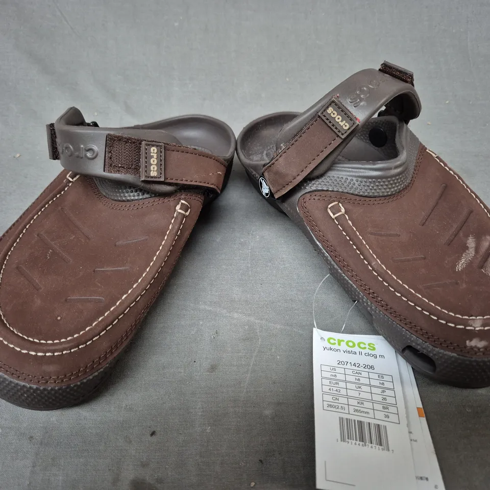 PAIR OF CROCS YUKON VISTA II CLOGS IN DARK BROWN UK SIZE 7