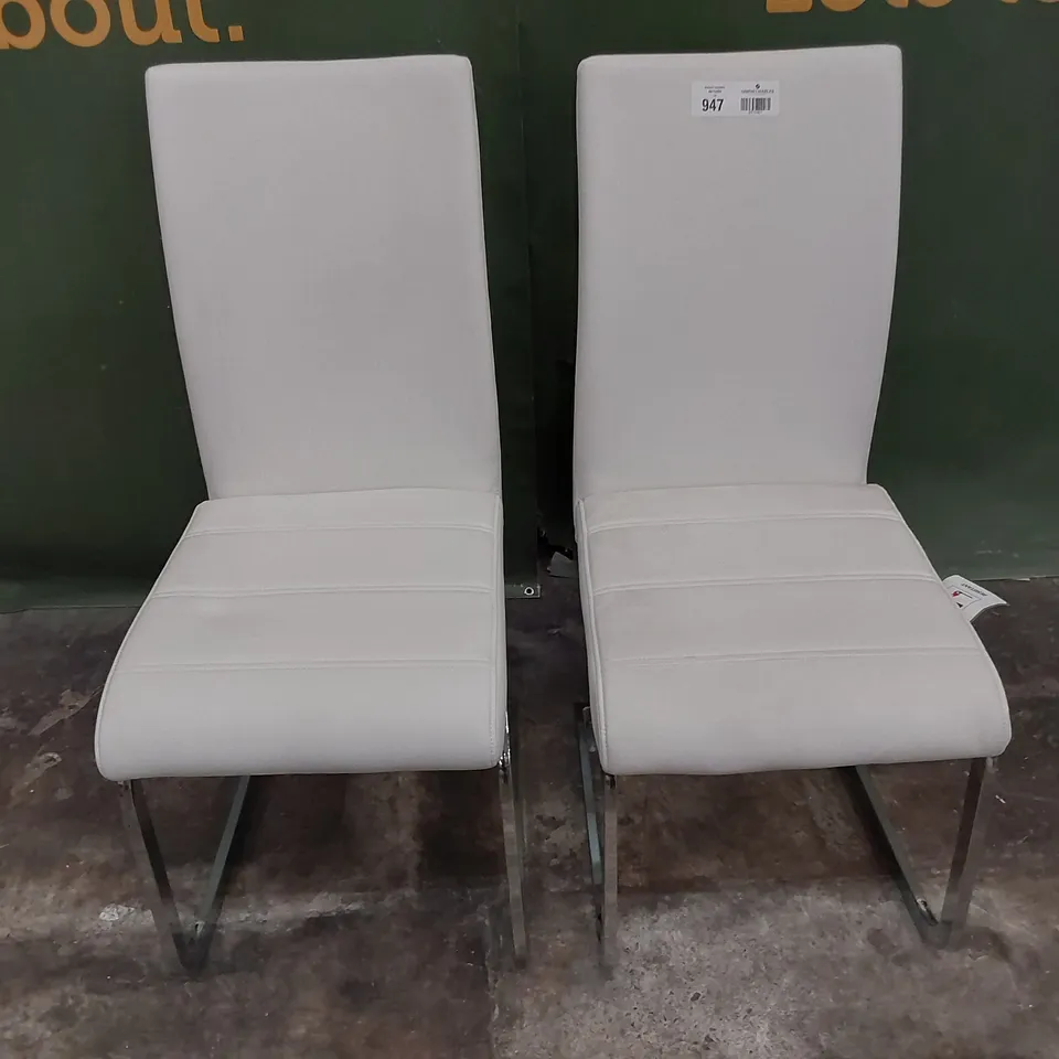 PAIR UPHOLSTERED DINING CHAIRS WHITE PU ON CHROME FRAMES 
