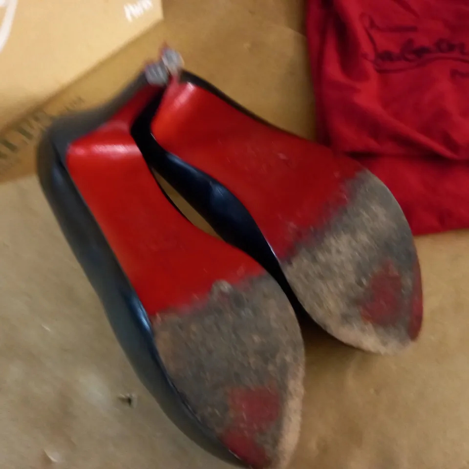 PAIR OF CHRISTIAN LOUBOUTIN BLACK HEELS - 40