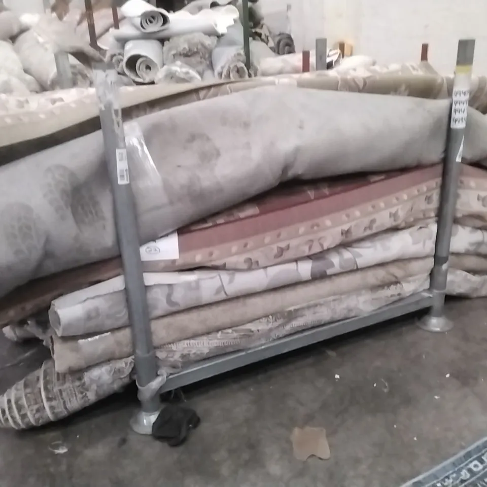 STILLAGE OF APPROXIMATELY 22 DESIGNER RUGS