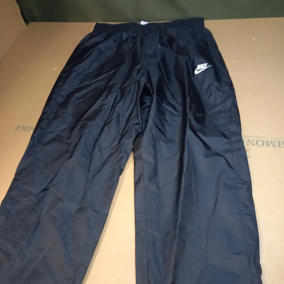 MENS NIKE LOOSE FIT TRACKSUIT BOTTOMS SIZE L