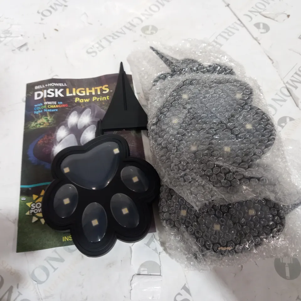 BOXED BELL AND HOWELL SET OF 4 SOLAR PAW LIGHTS