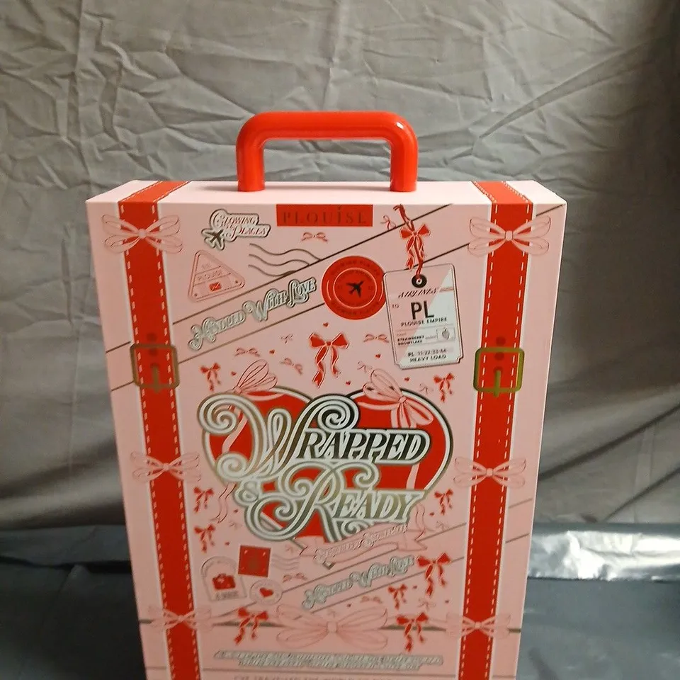 PLOUISE WRAPPED & READY WHEELED SUITCASE BEAUTY GIFT SET
