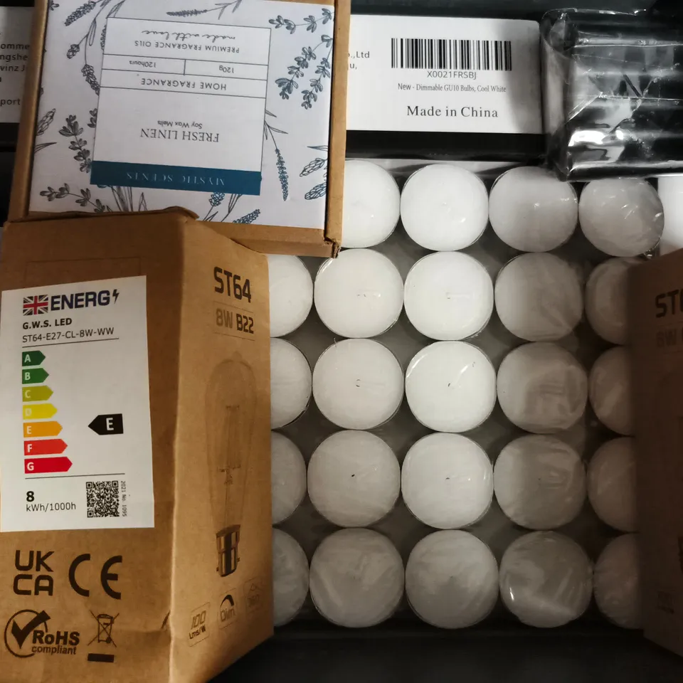 APPROXIMATELY 10 ASSORTED HOUSEHOLD ITEMS TO INCLUDE TEALIGHT CANDLES, HALOGEN SPOTLIGHTS, ETC