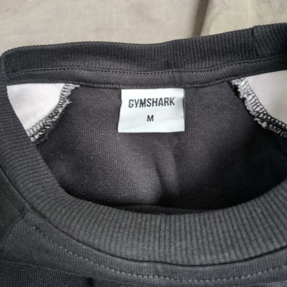 GYMSHARK T-SHIRT – BLACK WITH WHITE SIDE PANELS, SIZE M
