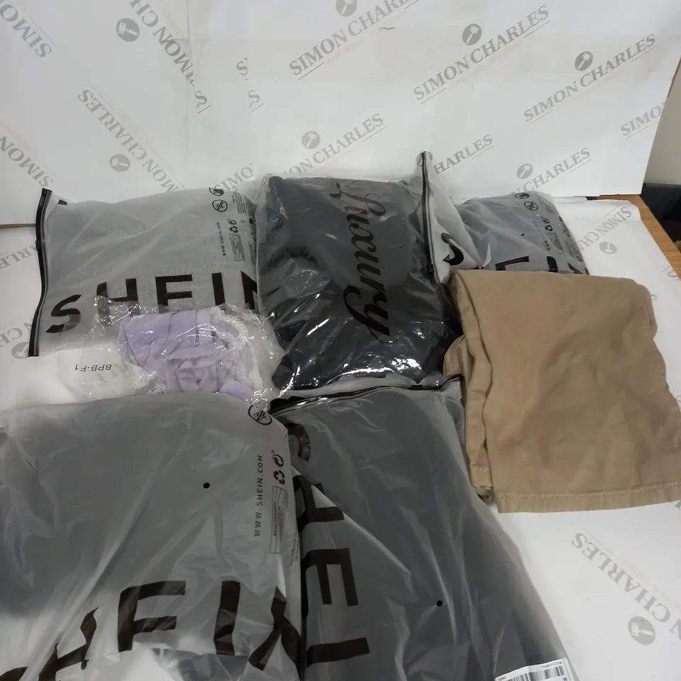LARGE BOX OF ASSORTED CLOTHING ITEMS IN VARIOUS COLOURS AND SIZES INCLUDING TROUSERS , TOPS AND JUMPERS 
