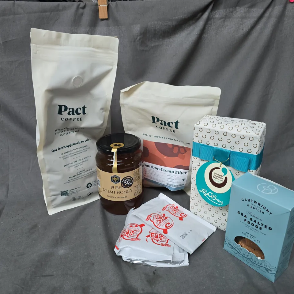 APPROXIMATELY 12 ASSORTED FOOD & DRINK ITEMS TO INCLUDE PURE WELSH HONEY, PACT COFFEE BOURBON CREAM FILTER, SA SALTED FUDGE, ETC - COLLECTION ONLY