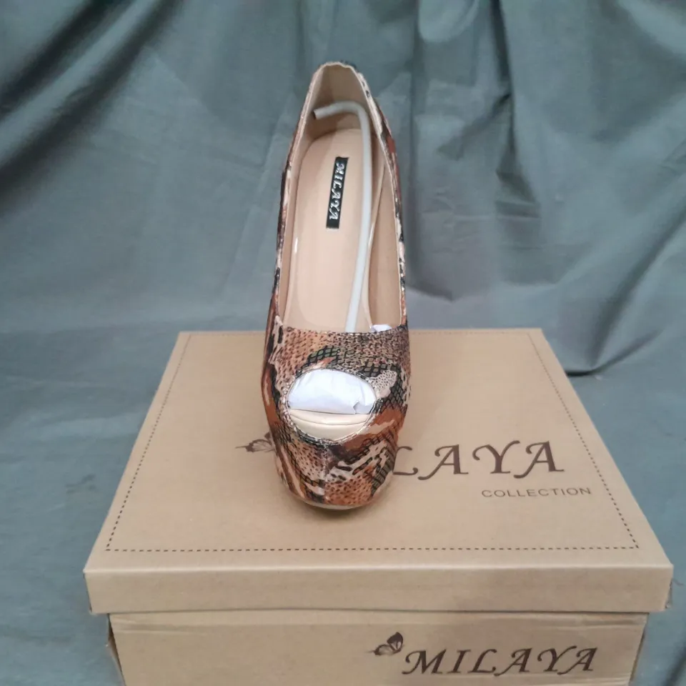 APPROXIMATELY 12 SNAKE SKIN STYLE PLATFORM HIGH HEELS VARIOUS SIZES TO INCLUDE SIZE 6