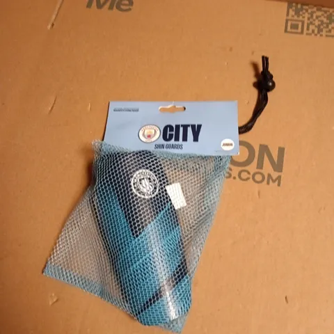 MAN CITY SHIN GUARDS – PROTECTIVE SPORTS GEAR (BLUE) - JUNIOR