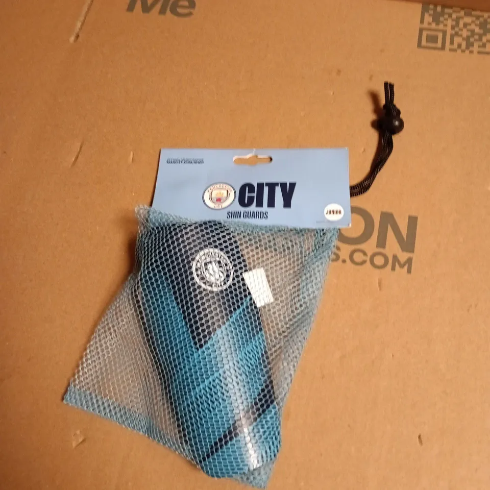  MAN CITY SHIN GUARDS – PROTECTIVE SPORTS GEAR (BLUE) - JUNIOR 