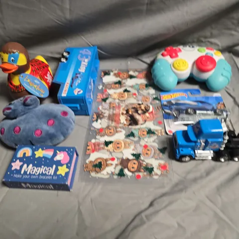 TOTE OF APPROXIMATELY 10 ASSORTED TOYS AND GAMES TO INCLUDE HOT WHEELS, TEDDIES AND STICKERS 