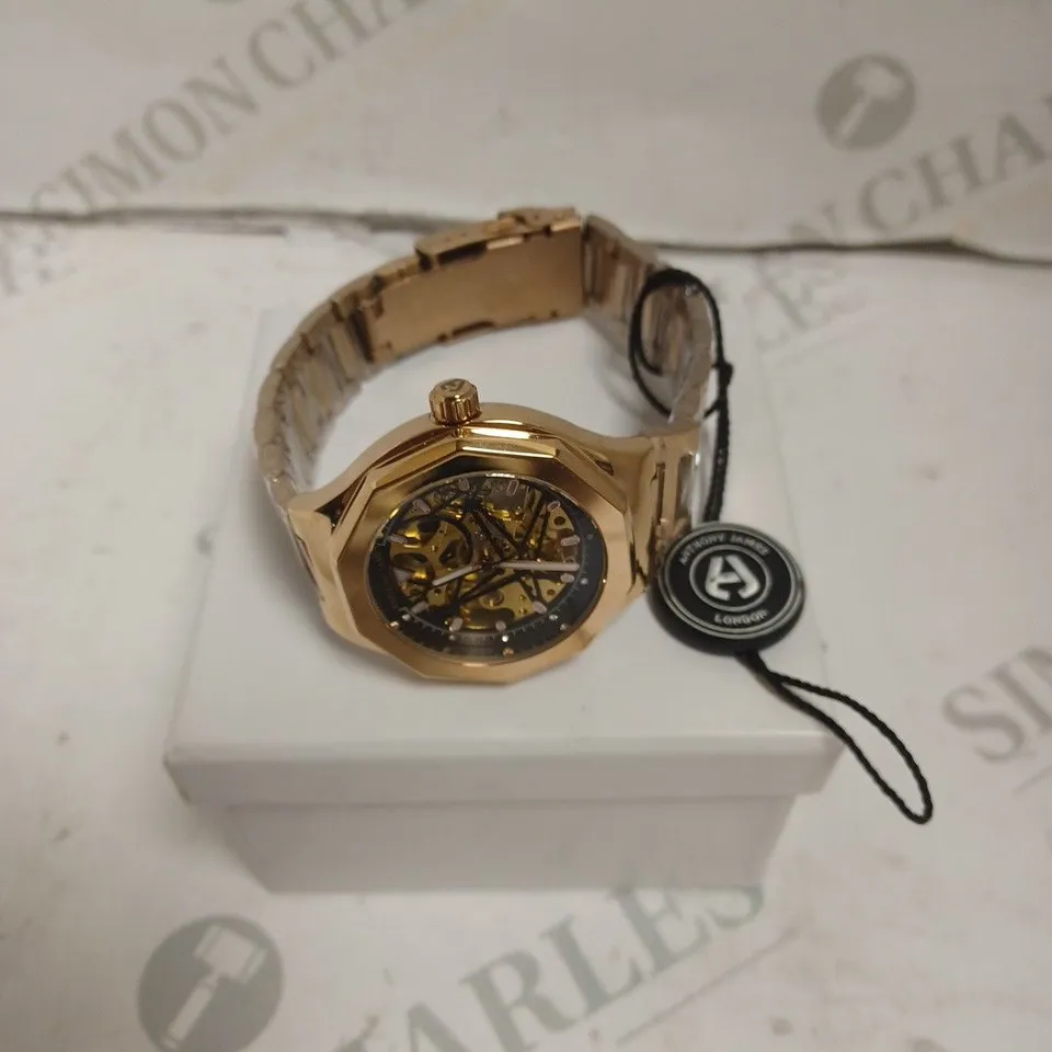 BOXED ANTHONY JAMES GENTS SPORTS SKELETON WATCH WITH STAINLESS STEEL BRACELET. 