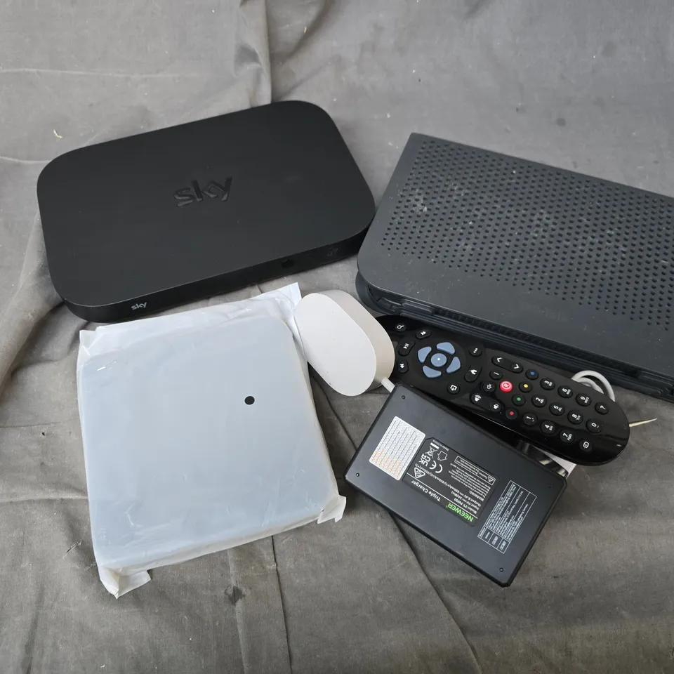 APPROXIMATELY 8 ASSORTED HOUSEHOLD ITEMS TO INCLUDE TV REMOTES, ROUTERS, CABLES, ETC