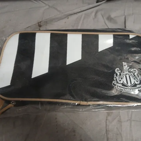 NEWCASTLE UNITED BRANDED WASH BAG – BLACK WITH WHITE STRIPES
