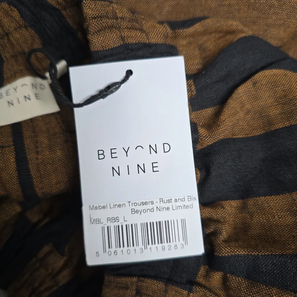 BEYOND NINE MABEL LINEN TROUSERS – RUST & NAVY STRIPES, SIZE L