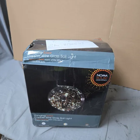 BOX OF ASSORTED HOUSEHOLD ITEMS INCLUDING NOMA HANGING SOLAR COPPER-WIRE GLASS BALL LIGHT; ROUND WOOD GEOMETRIC CLOCK
