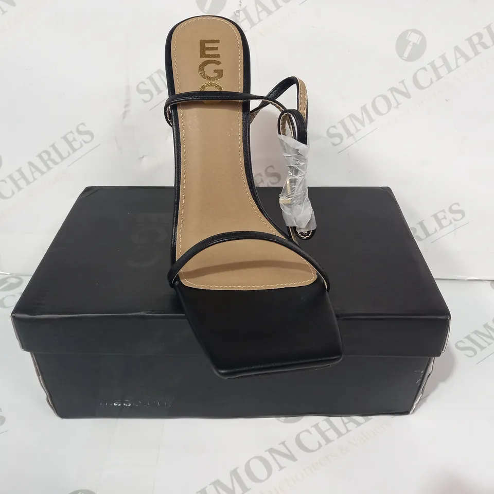 BOXED PAIR OF EGO FARAH OPEN TOE HIGH HEELS IN BLACK/GOLD EFFECT UK SIZE 6
