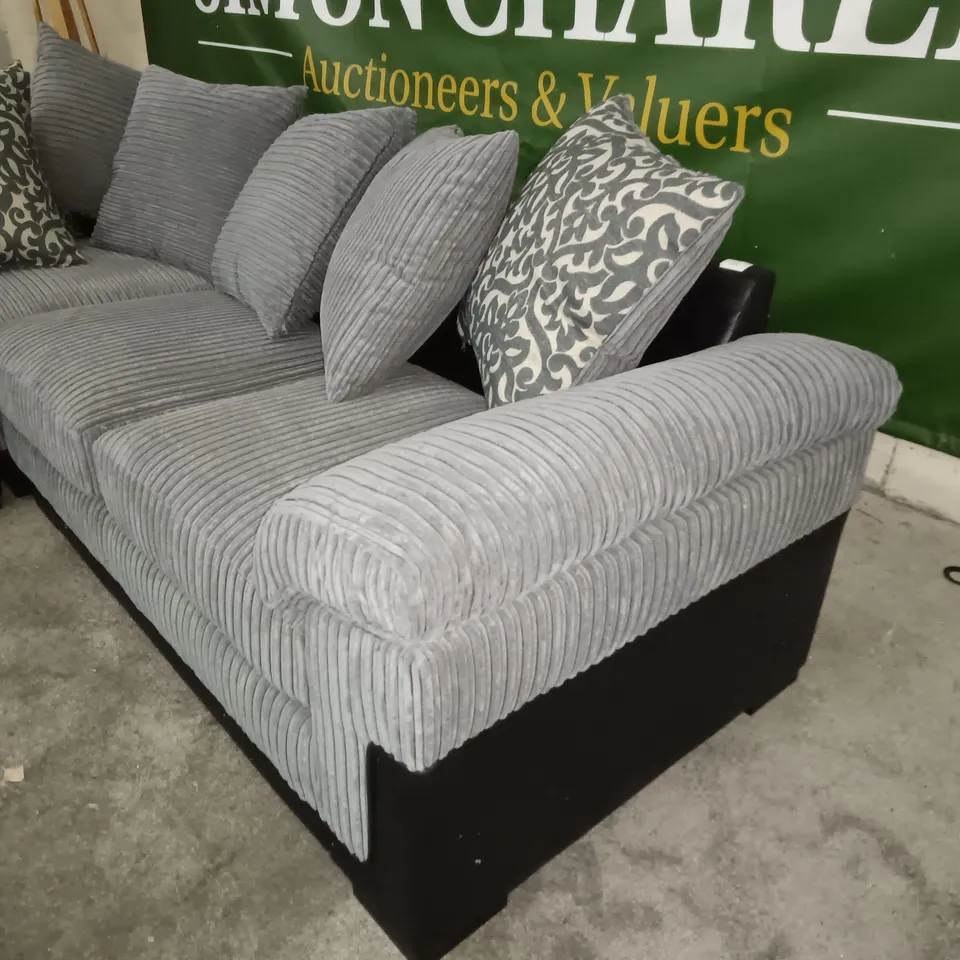 TWO-TONE GREY JUMBO CORD AND BLACK FAUX LEATHER CORNER SOFA