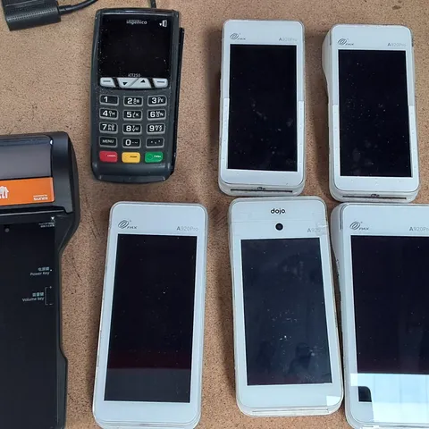 LOT OF 7 ASSORTED HAND HELD PAYMENT TERMINALS TO INCLUDE SUMNI V2S PLUS AND PAX A920 PRO