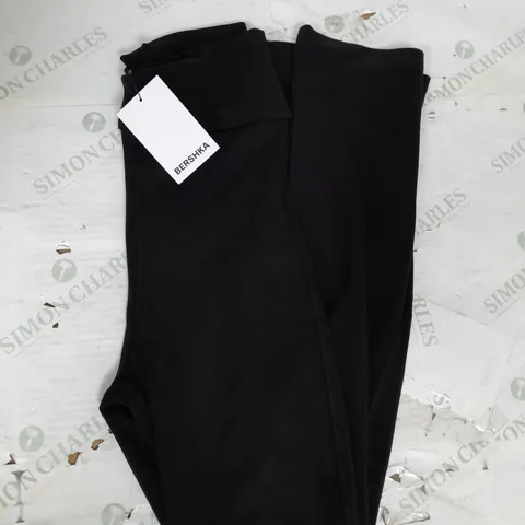 BERSHKA HIGH WAIST FLARED YOGA PANTS IN BLACK SIZE M