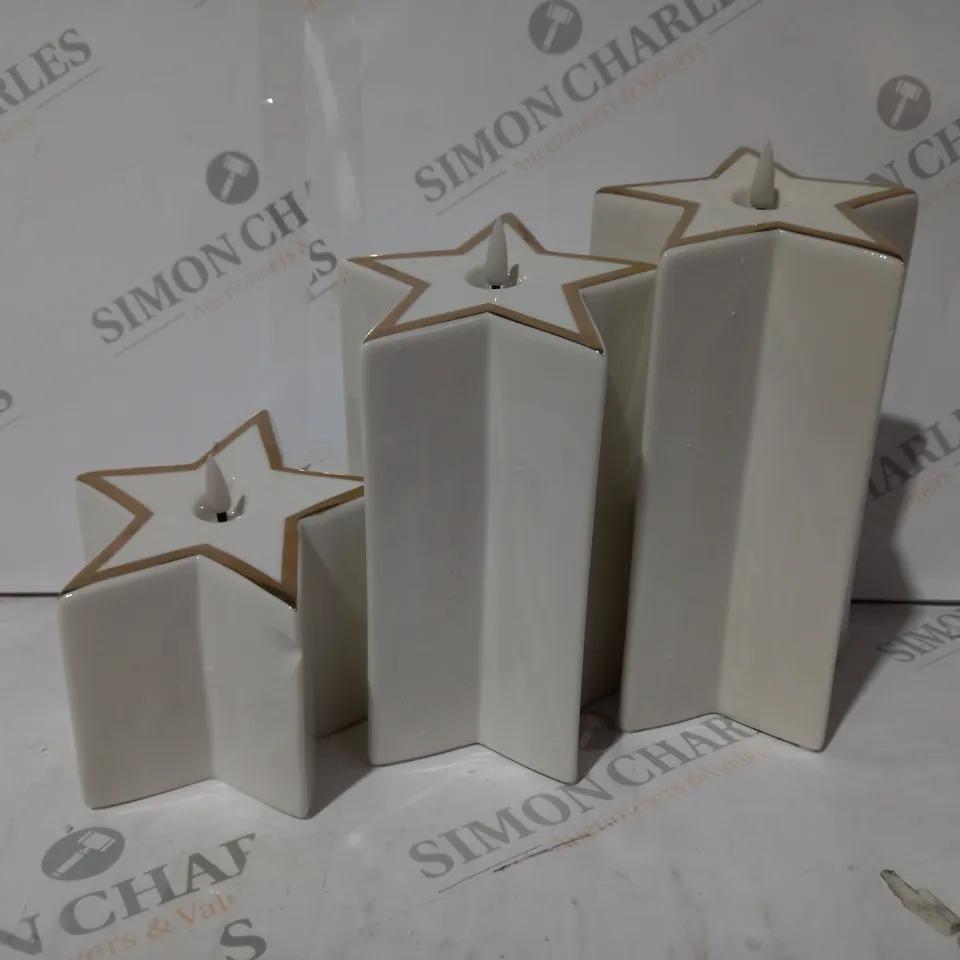 BOXED HOME REFLECTIONS SET OF 3 PRE-LIT WHITE STAR CANDLES