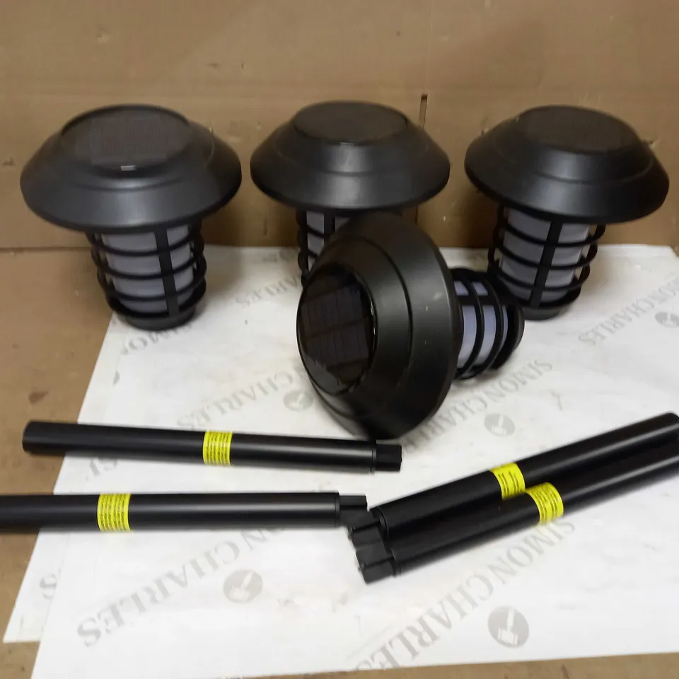 BELL & HOWELL SET OF SOLAR LUMENS DUAL FUNCTION FLAME/ WHITE STAKE LIGHTS