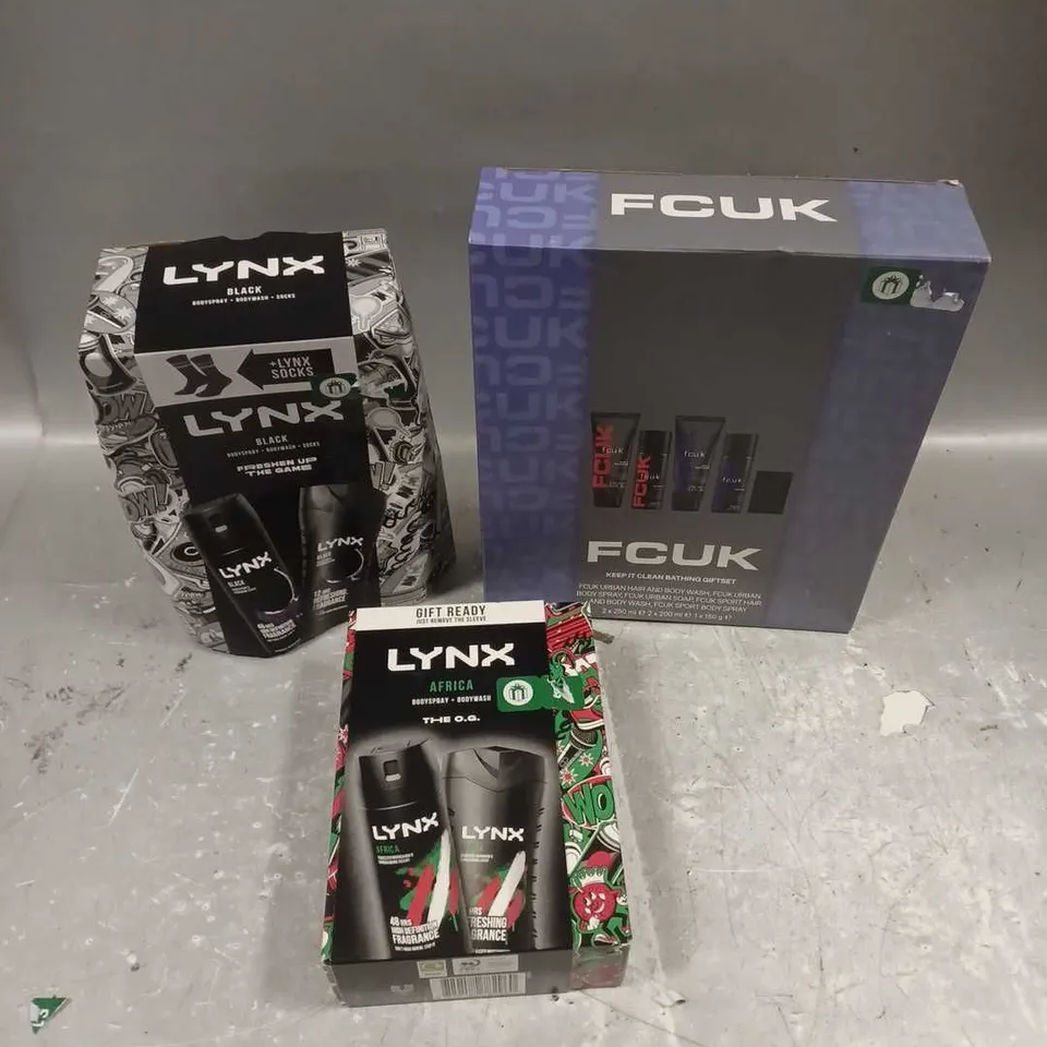 LOT OF 3 ASSORTED COSMETIC BOXSETS TO INCLUDE - LYNX AFRICA BODY DUO - LYNX BLACK SOCKS SET - FCUK BATHING GIFTSET