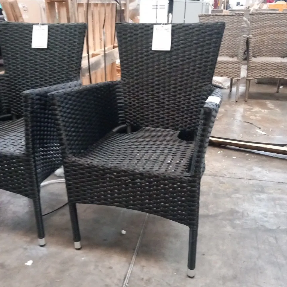 FOUR RATTAN EFFECT STACKING GARDEN CHAIRS
