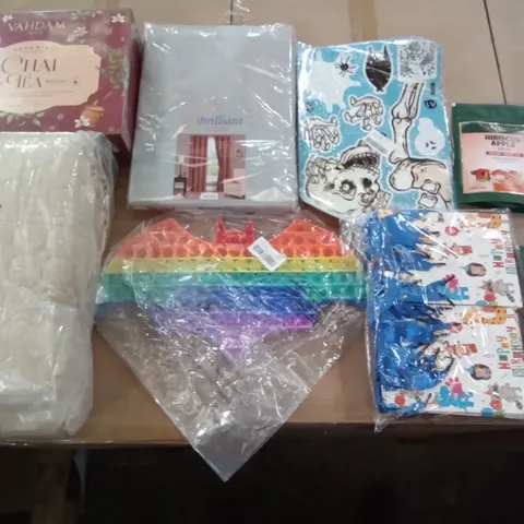 PALLET OF ASSORTED ITEMS INCLUDING VAHDAM HIBISCUS APPLE ICED TEA, BATMAN FIDGET TOY, BRILLIANT CURTAINS, HALLOWEEN WINDOW STICKERS, QUILTED BEDSPREAD, VAHDAM CHAI TEA
