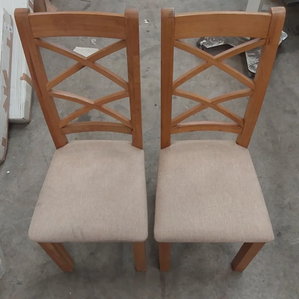 PAIR OF DESIGNER CROSS BACK WOODEN DINING CHAIRS WITH UPHOLSTERED PADDING