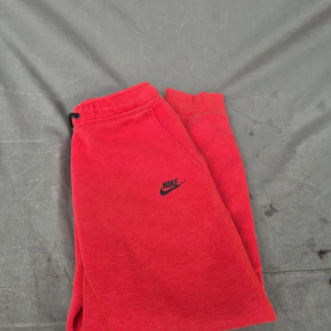 NIKE RED JOGGERS WITH SWOOSH LOGO - SIZE L - KIDS