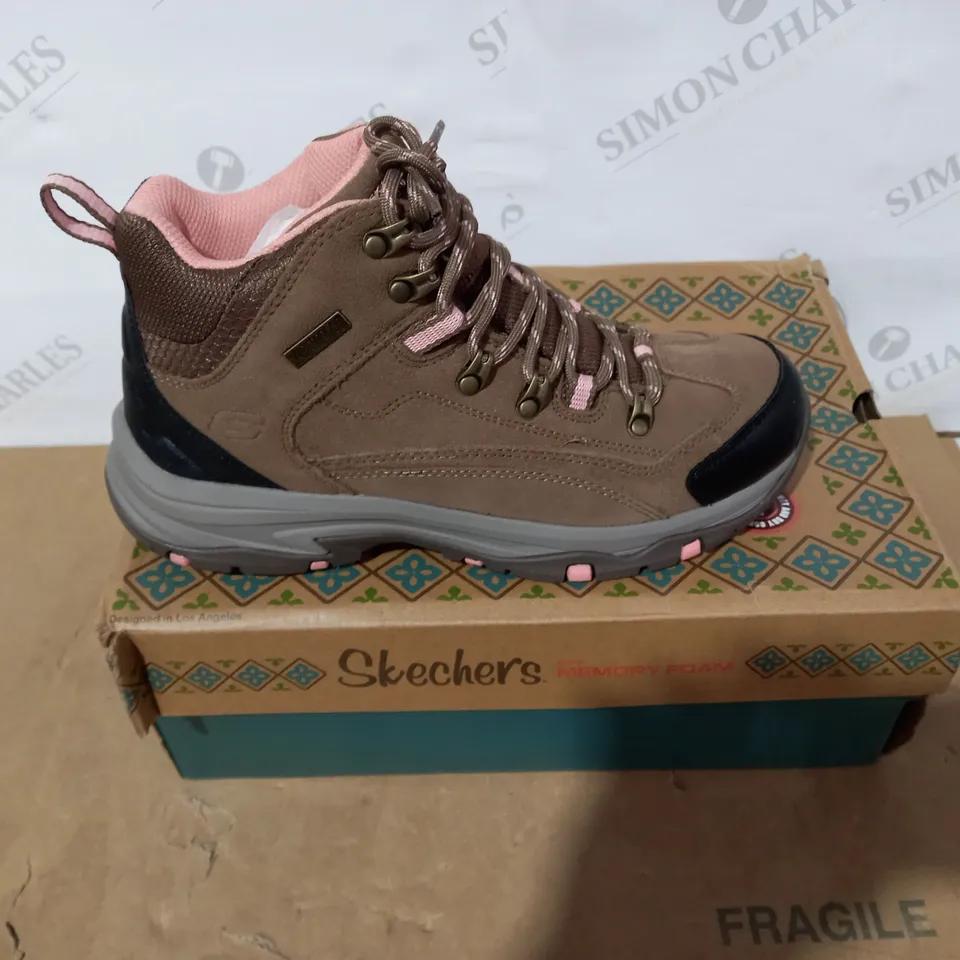 BOXED PAIR OF SKECHERS WALKING BOOTS- SIZE 6